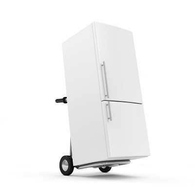 white refrigerator being hauled away on a hand truck